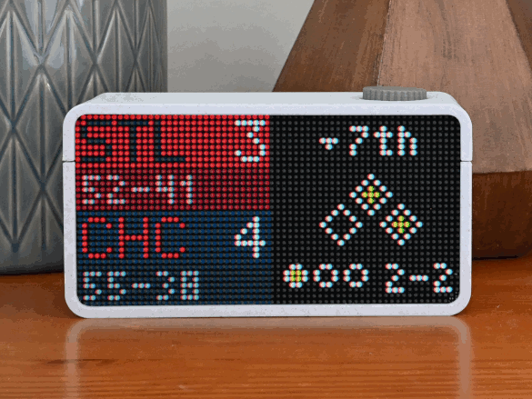 The Northern Bytes display showing live scores, a schedule, and the time on its LED matrix